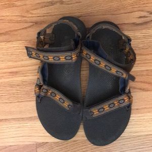 Size 9 Teva in brown with orange, aztec straps
